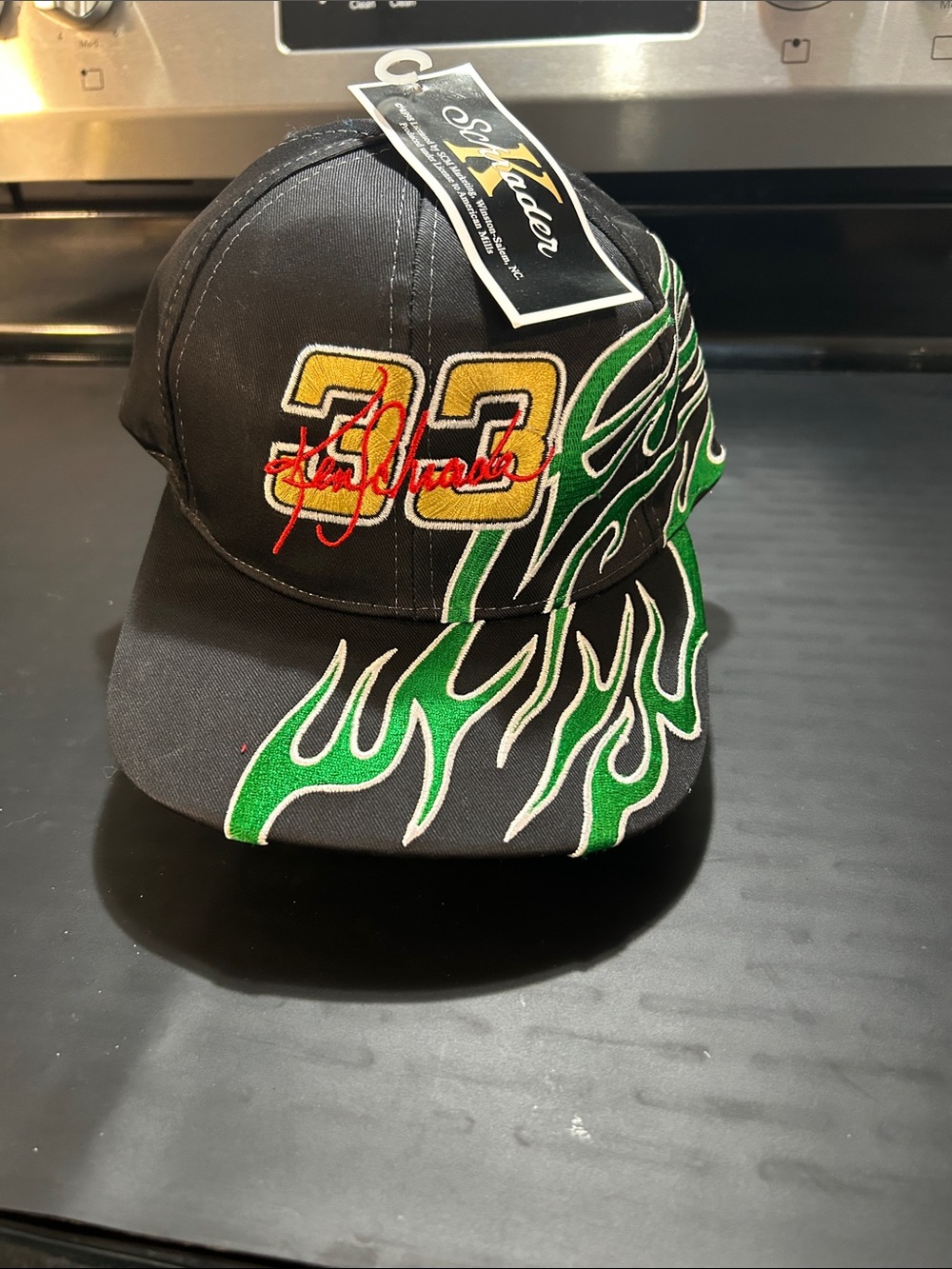 Black Cap with Green Flame Detail and 33 embroidery